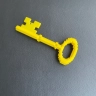 Pixelated Yellow Key Figure