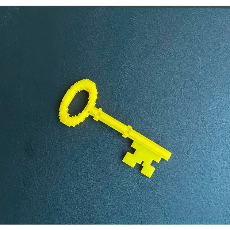 Pixelated Yellow Key Figure