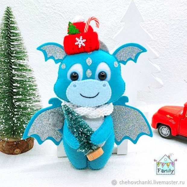 Turquoise dragon with a Christmas tree Plush Toy