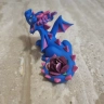 Dark Blue Dragon Figure with paper rose