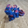 Dark Blue Dragon Figure with paper rose