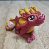 Pink Dragon Figure with paper flower