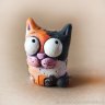 Thoughtful Cat Figure