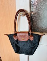 I’ll trade a 30x20 cm handbag for a bottle of milk.